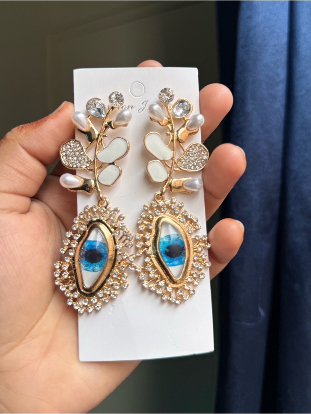 Schiaparelli Inspired Gold Statement Earrings with Blue Eye Accent